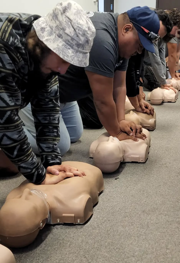 Happy satisfied CPR class student with certification